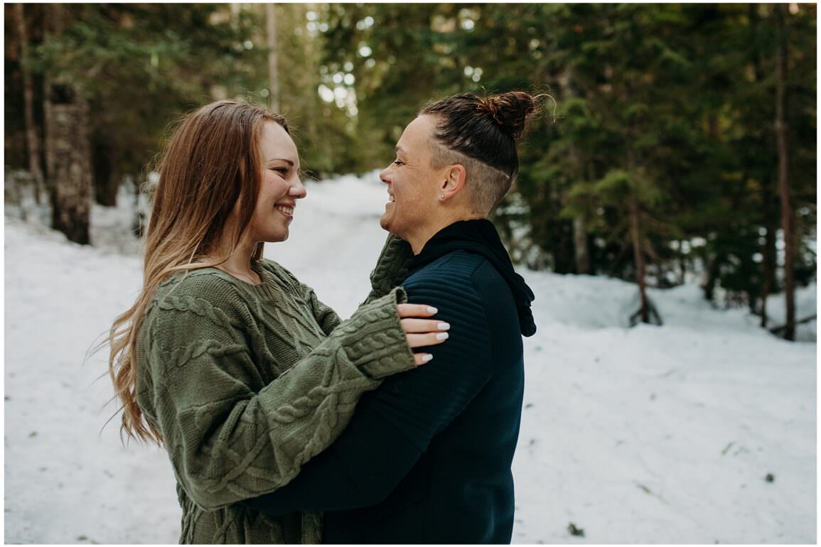 Lesbian Winter Engagement Session in Oregon Forest