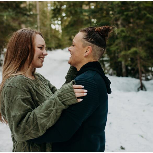 Lesbian Winter Engagement Session in Oregon Forest